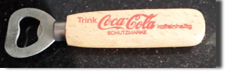 7807-2 € 4,00 coca cola opener hout trink